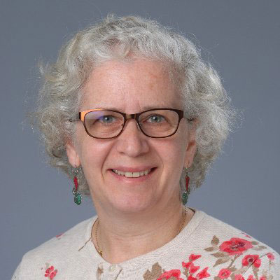 Portrait of Lilian Plotkin smiling at the camera.