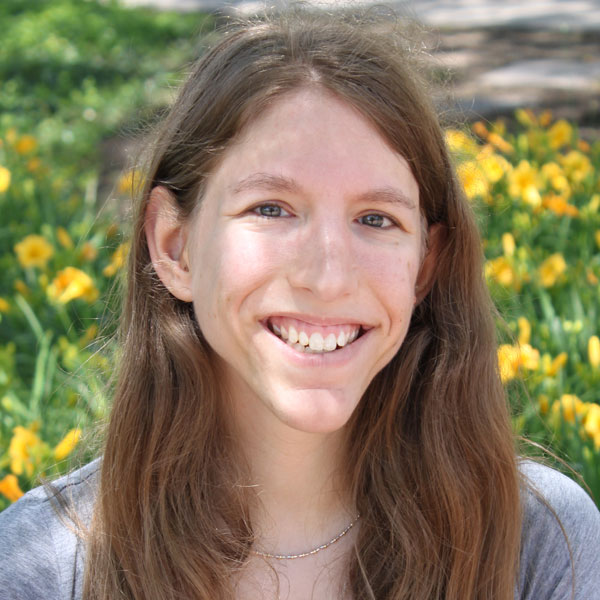 Portrait of Zoe Talman smiling at the camera.