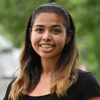 Portrait of Rachel Moreno smiling at the camera.