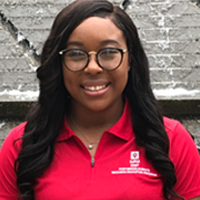 Portrait photo of Cierra Isom smiling at the camera.