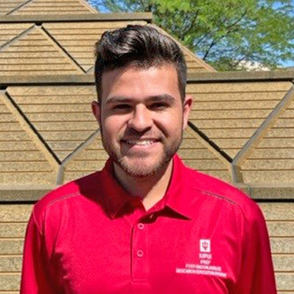 Portrait photo of Andres Prieto Trujillo smiling at the camera.