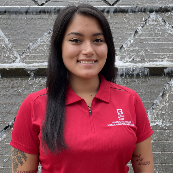 Portrait photo of Selena Martinez smiling at the camera.