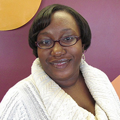 Portrait of Tabitha Hardy smiling at the camera.